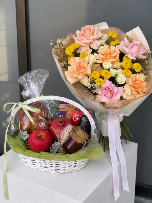 A Sweet Year Ahead Rosh Hashanah bouquet and gift basket with challah, apples, pomegranate, honey and kosher treats