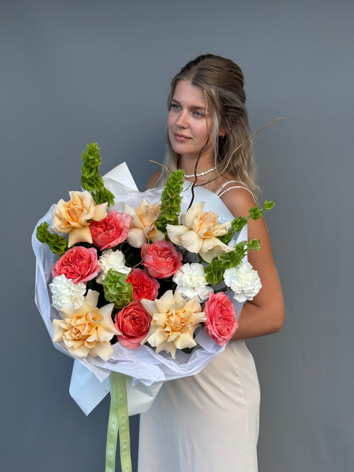 European-style bouquet with premium garden roses and Bells of Ireland