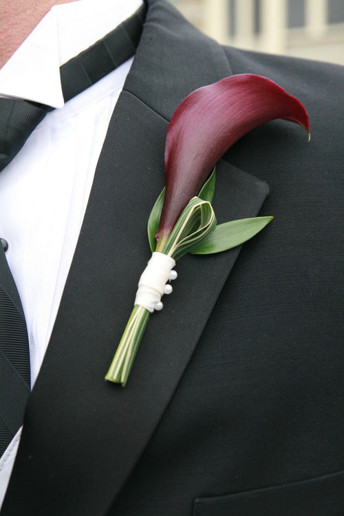 Boutonniere with a purple calla lily