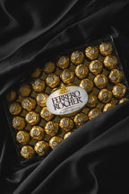 Box of candies with golden outer cover