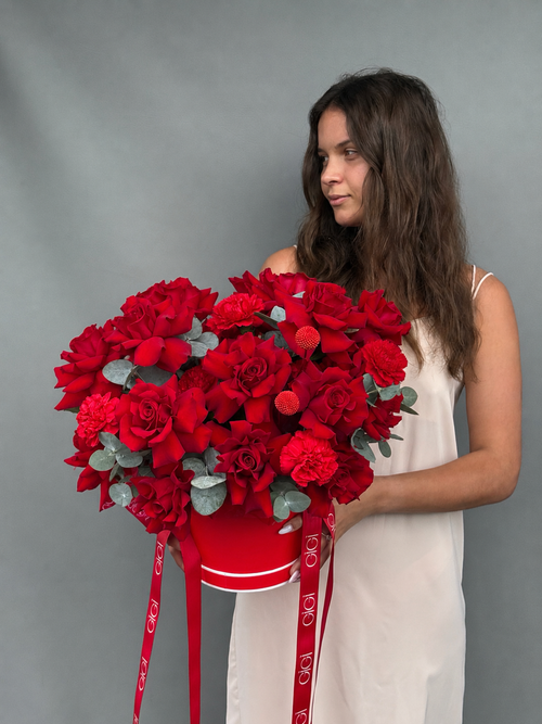 Luxury red flower box featuring premium red roses and carnations