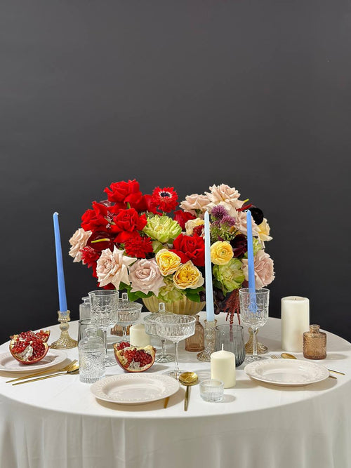 Flowers pot with multi-colored roses