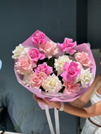 Bouquet of pink, peach and white flowers