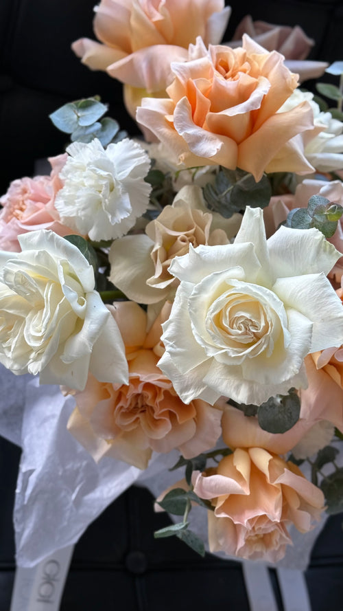 Creme and peach roses