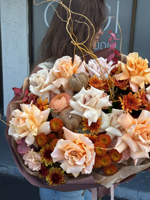     Peach and cream rose bouquet with fall chrysanthemums and burgundy accents by GiGi Flower Studio