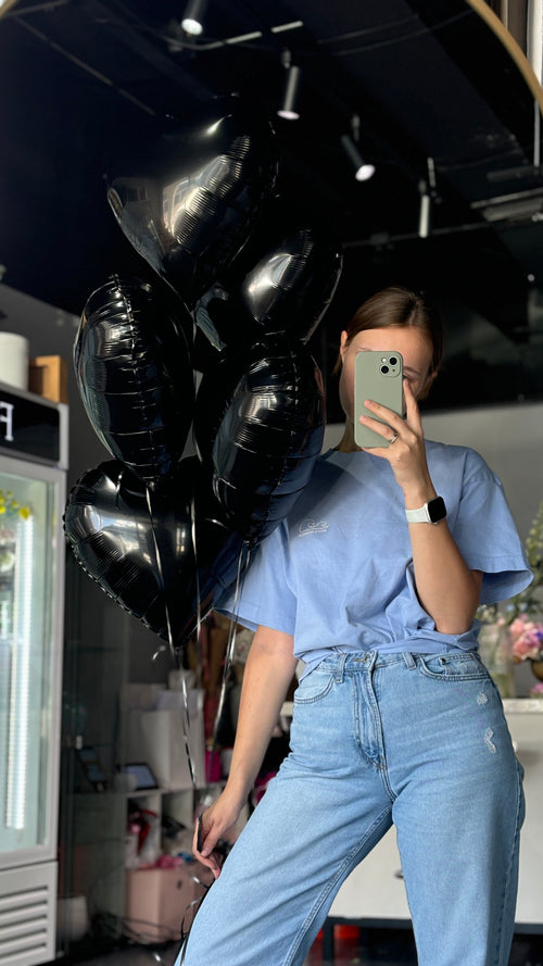 Black heart shaped balloons