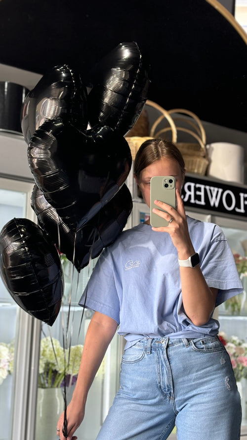 Black heart shaped balloons